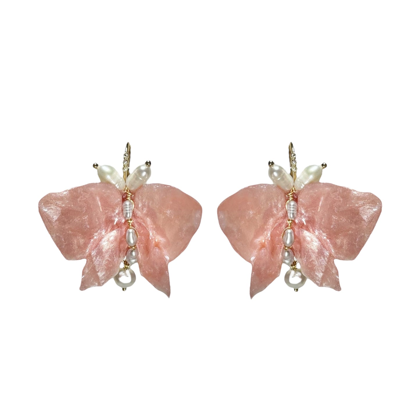 Soft pink butterfly earrings made from upcycled materials, featuring a romantic Pink Chiffon finish and delicate handmade detailing.