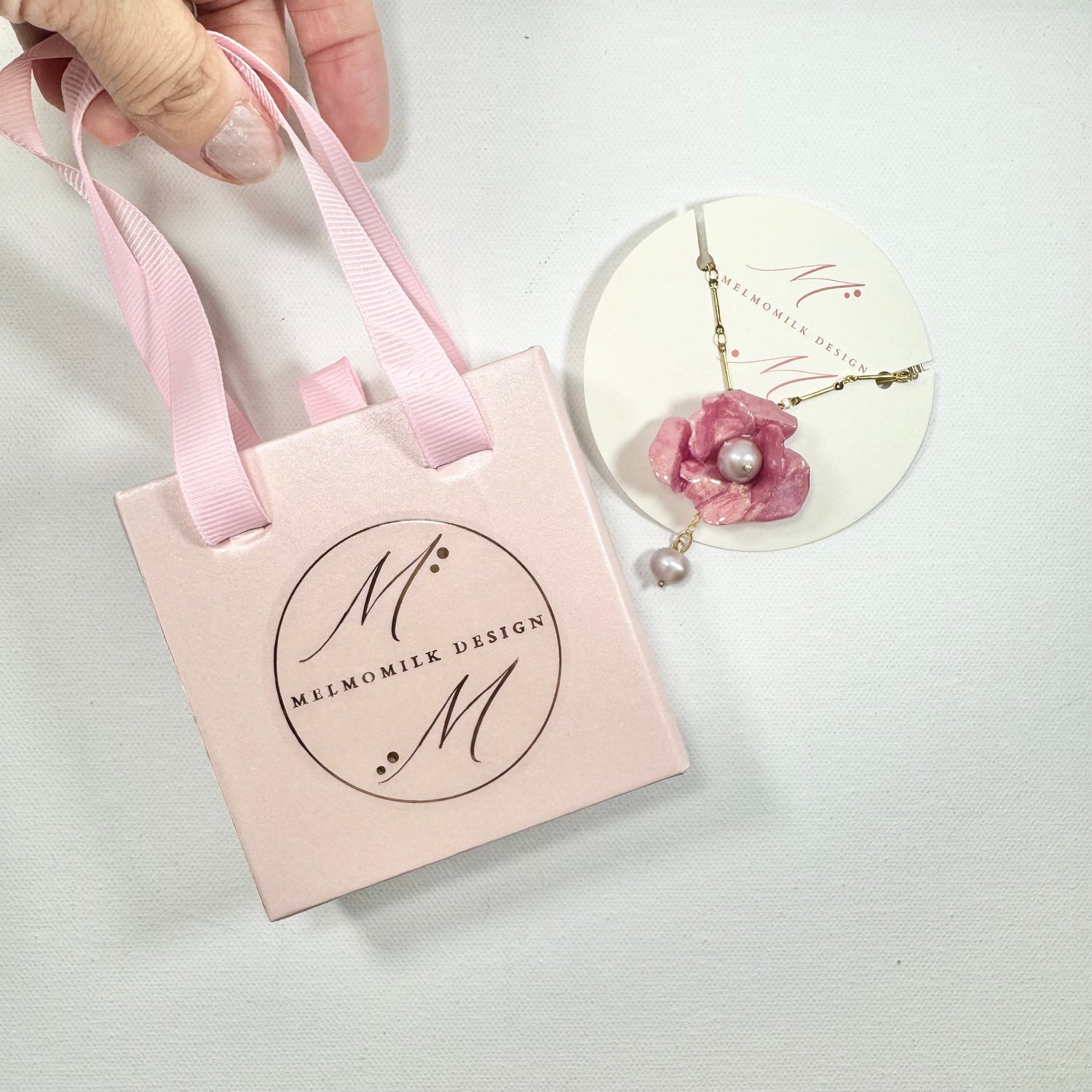 Handcrafted Anemone necklace made from upcycled plastic, inspired by Japanese anemones in Antique petal pink rose. Lightweight, eco-friendly statement jewelry for sustainable fashion lovers.