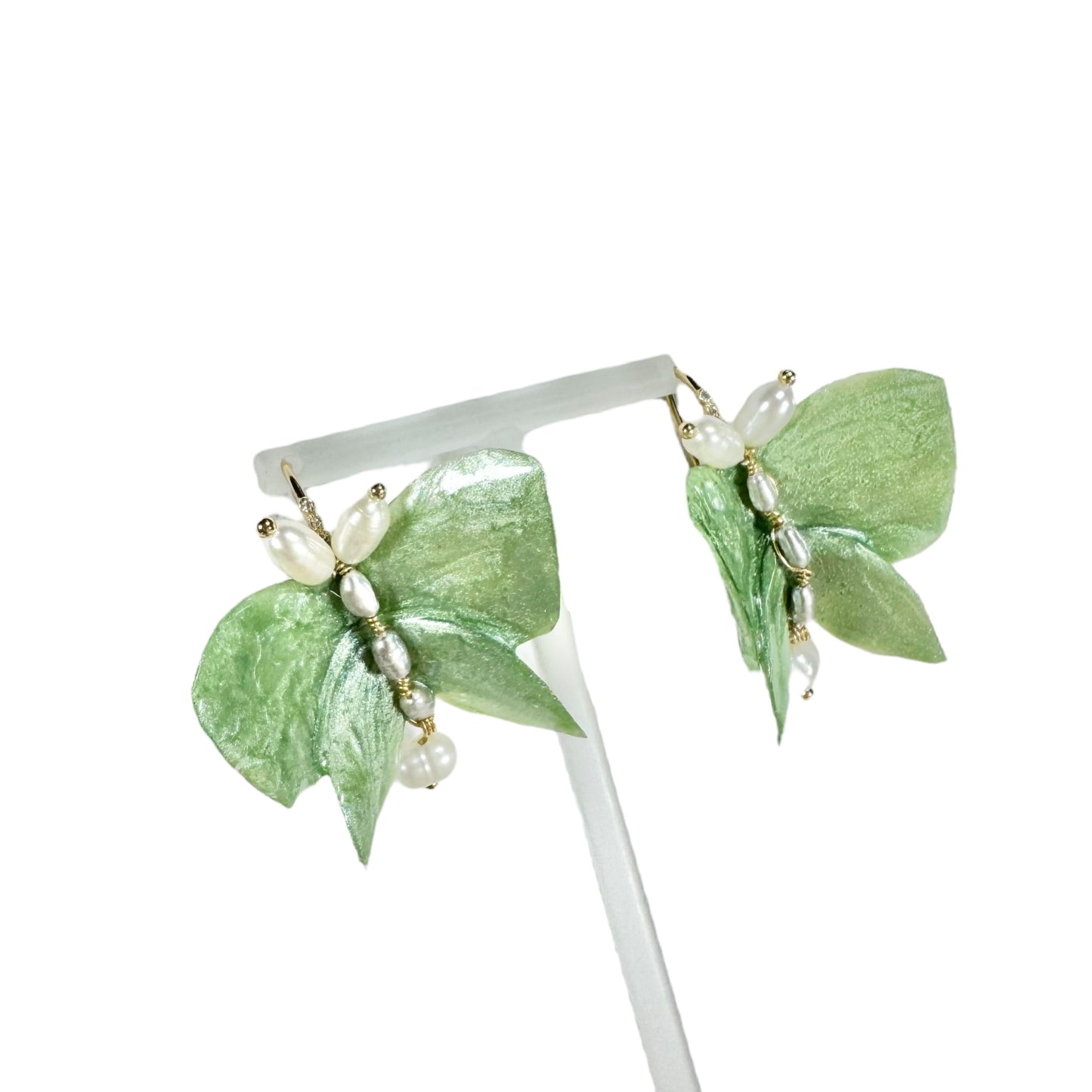 Upcycled butterfly earrings in soft mint green, handcrafted with a nature-inspired design and finished in a fresh Mint Breeze tone.