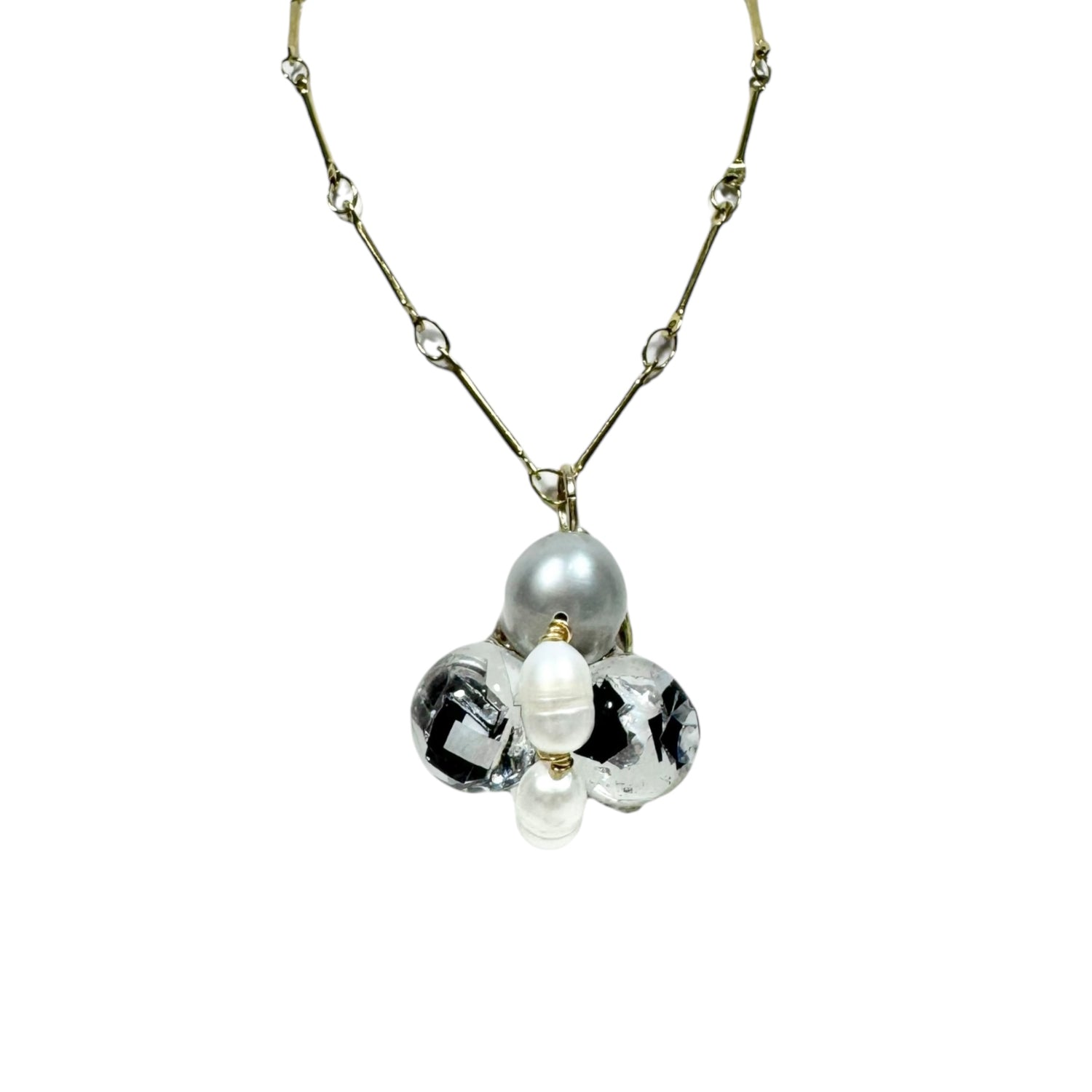 Bee Divine midnight black bee necklace with fresh water pearls handcrafted from upcycled plastic, featuring delicate bee-inspired designs with lightweight, eco-friendly materials. A sustainable statement piece for nature lovers.