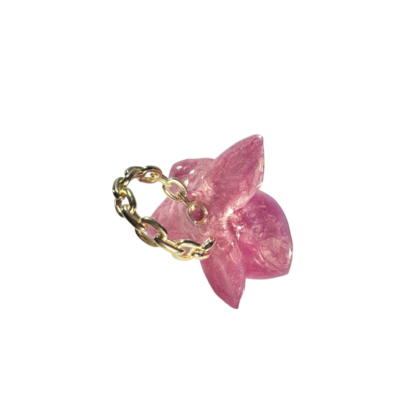 Handcrafted orchid flower ring in soft powder pink, made from upcycled materials with a velvet-like finish.