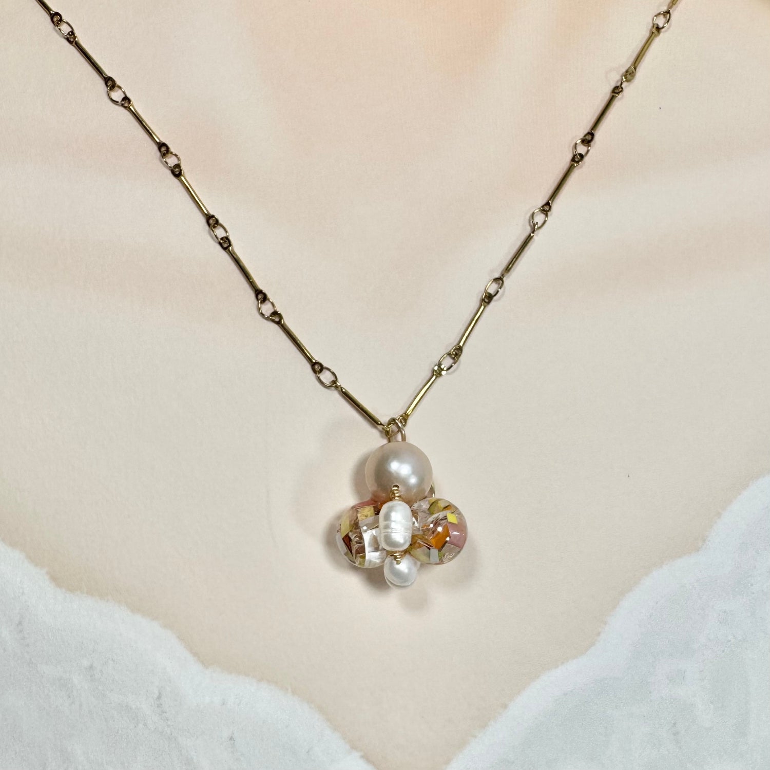 Bee Divine honey bee necklace with fresh water pearls handcrafted from upcycled plastic, featuring delicate bee-inspired designs with lightweight, eco-friendly materials. A sustainable statement piece for nature lovers.