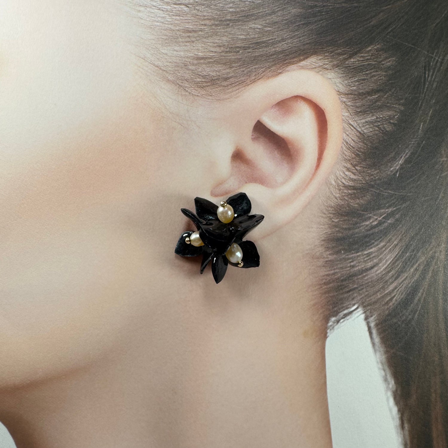 Lilac Fantasy earrings handcrafted from upcycled plastic, featuring pastel lilac, mint green, and black accents. Lightweight, eco-friendly statement jewelry for sustainable fashion lovers.