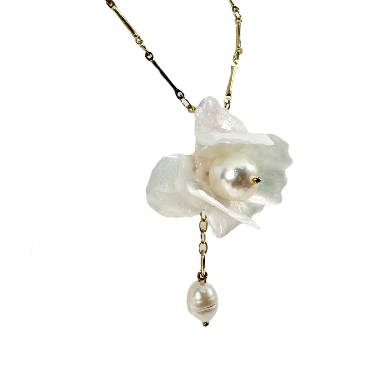 Handcrafted Anemone necklace made from upcycled plastic, inspired by Japanese anemones in white ivory pearl. Lightweight, eco-friendly statement jewelry for sustainable fashion lovers.