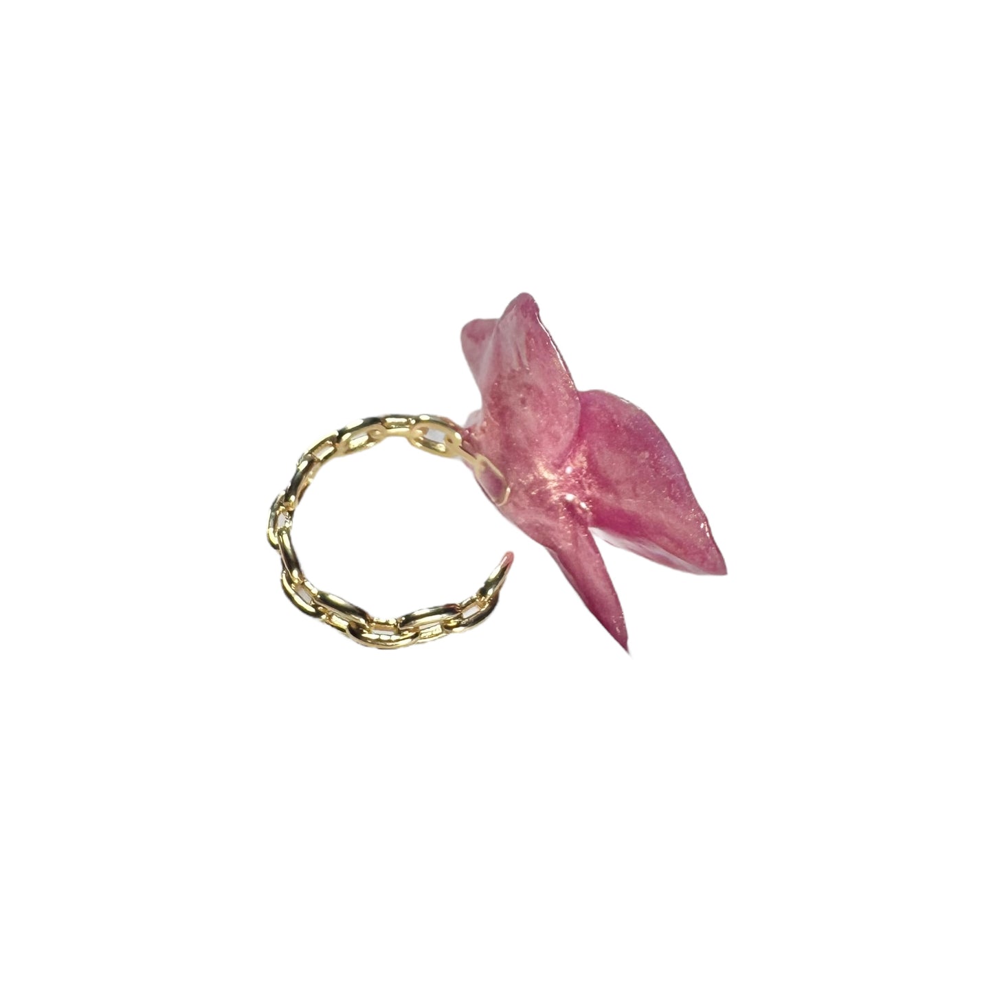 Handcrafted orchid flower ring in soft powder pink, made from upcycled materials with a velvet-like finish.