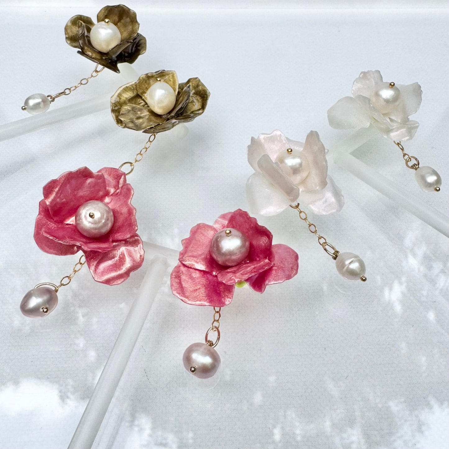 Anemone Collection earrings handcrafted from upcycled plastic, inspired by Japanese white pearl anemones. Lightweight, nature-inspired statement jewelry for eco-conscious fashion lovers.