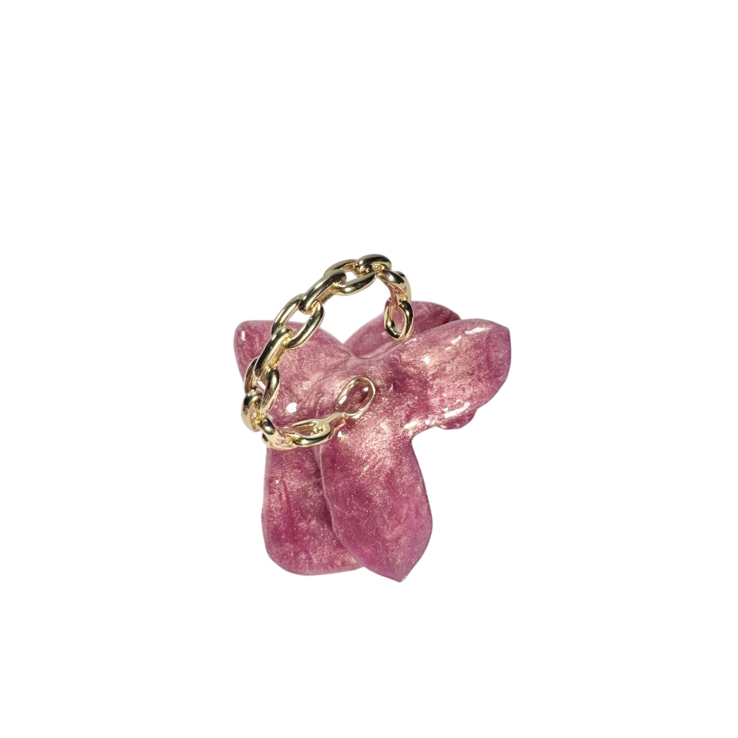 Handcrafted orchid flower ring in soft powder pink, made from upcycled materials with a velvet-like finish.