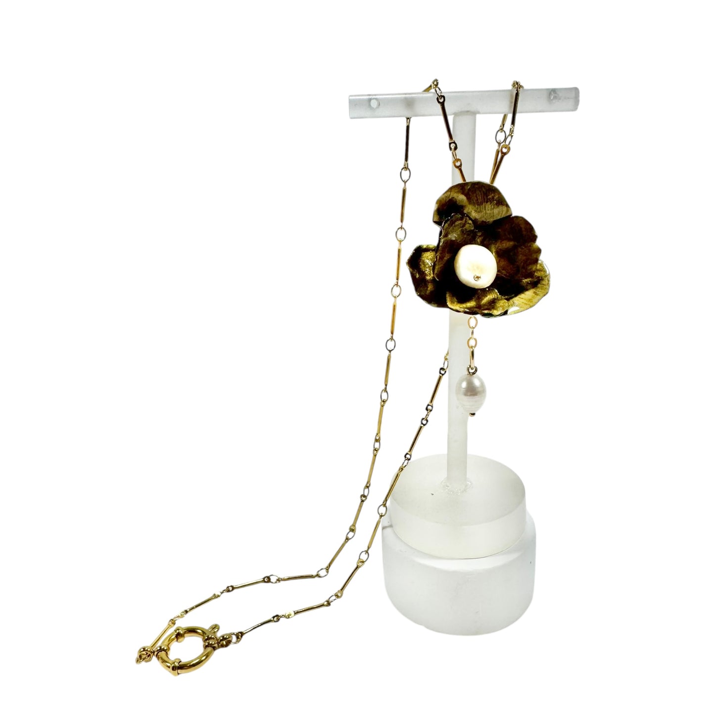 Handcrafted Anemone necklace made from upcycled plastic, inspired by Japanese anemones in vintage gold. Lightweight, eco-friendly statement jewelry for sustainable fashion lovers.
