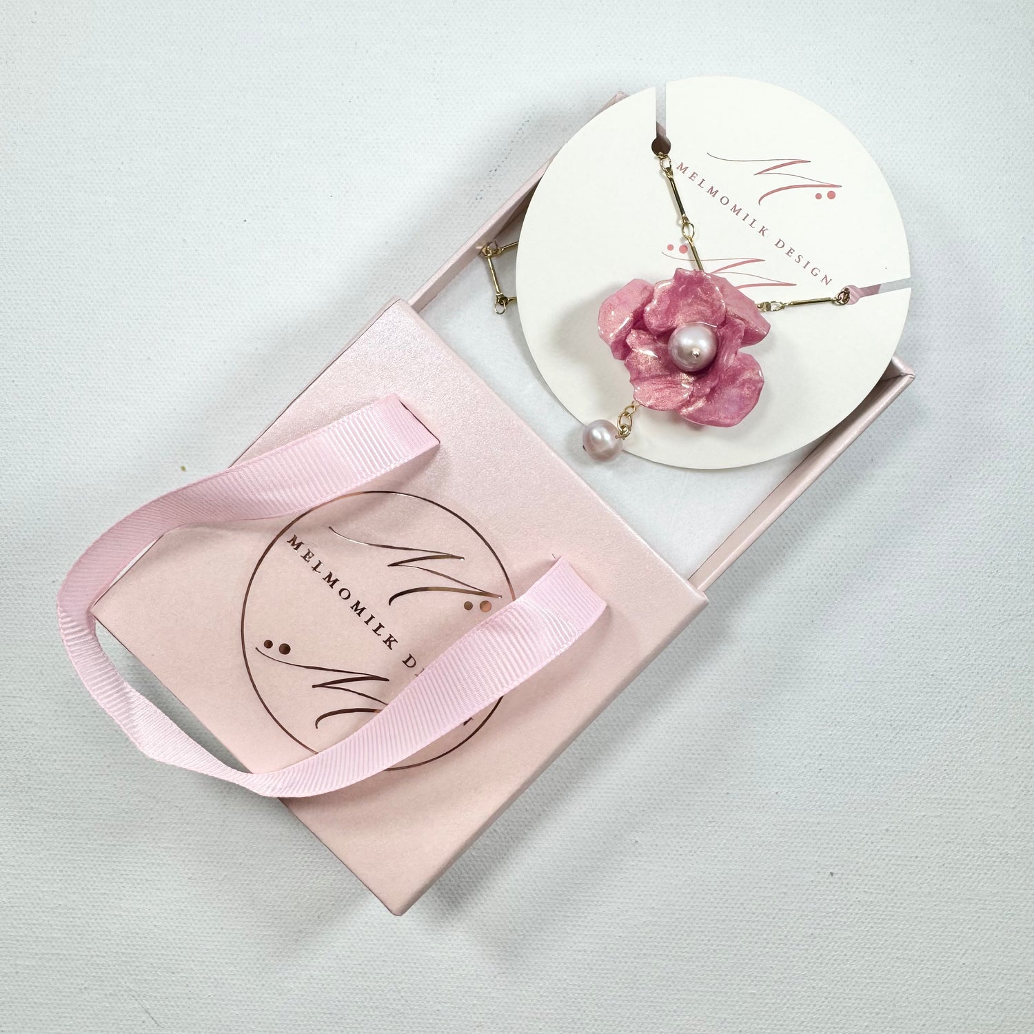 Handcrafted Anemone necklace made from upcycled plastic, inspired by Japanese anemones in Antique petal pink rose. Lightweight, eco-friendly statement jewelry for sustainable fashion lovers.