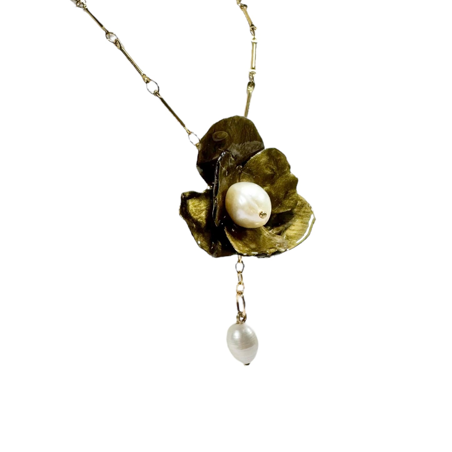 Handcrafted Anemone necklace made from upcycled plastic, inspired by Japanese anemones in vintage gold. Lightweight, eco-friendly statement jewelry for sustainable fashion lovers.
