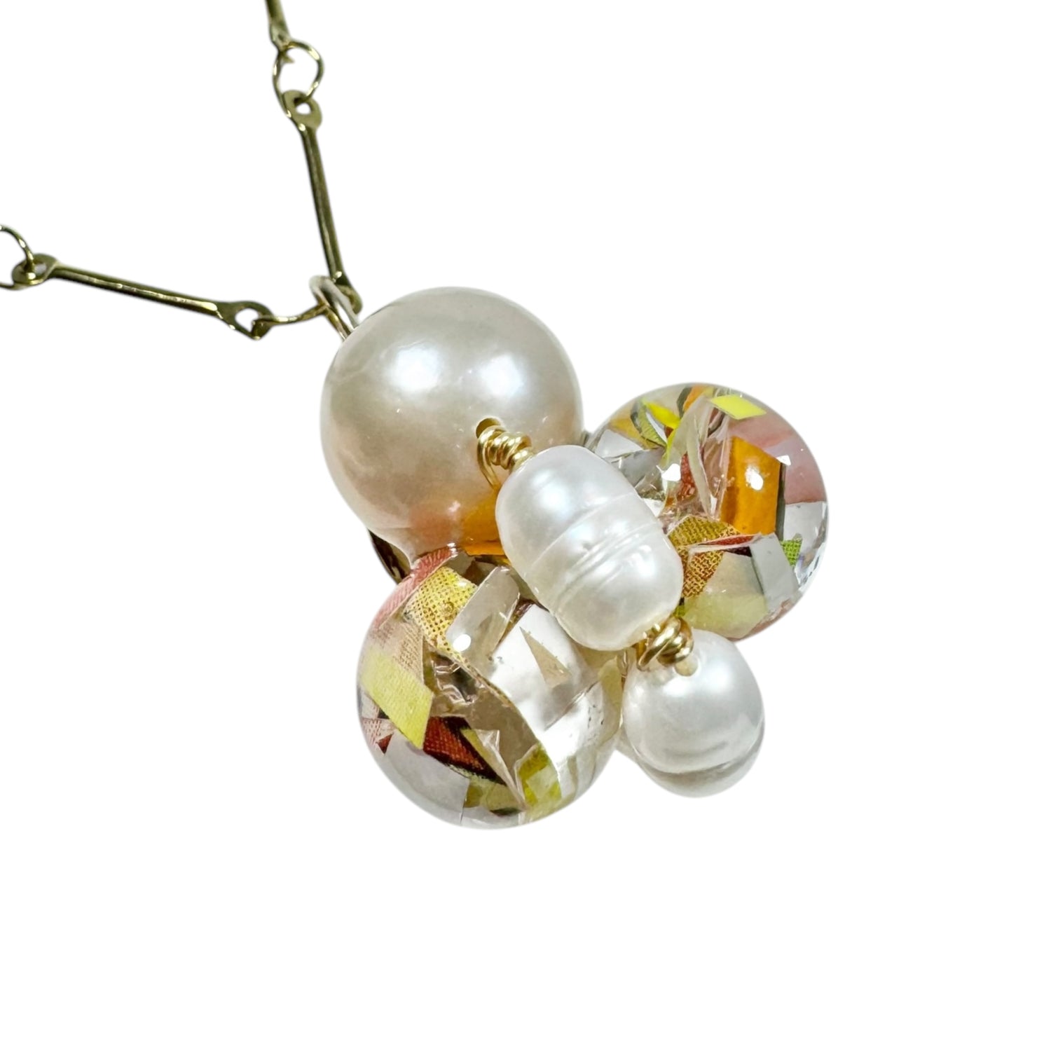 Bee Divine honey bee necklace with fresh water pearls handcrafted from upcycled plastic, featuring delicate bee-inspired designs with lightweight, eco-friendly materials. A sustainable statement piece for nature lovers.