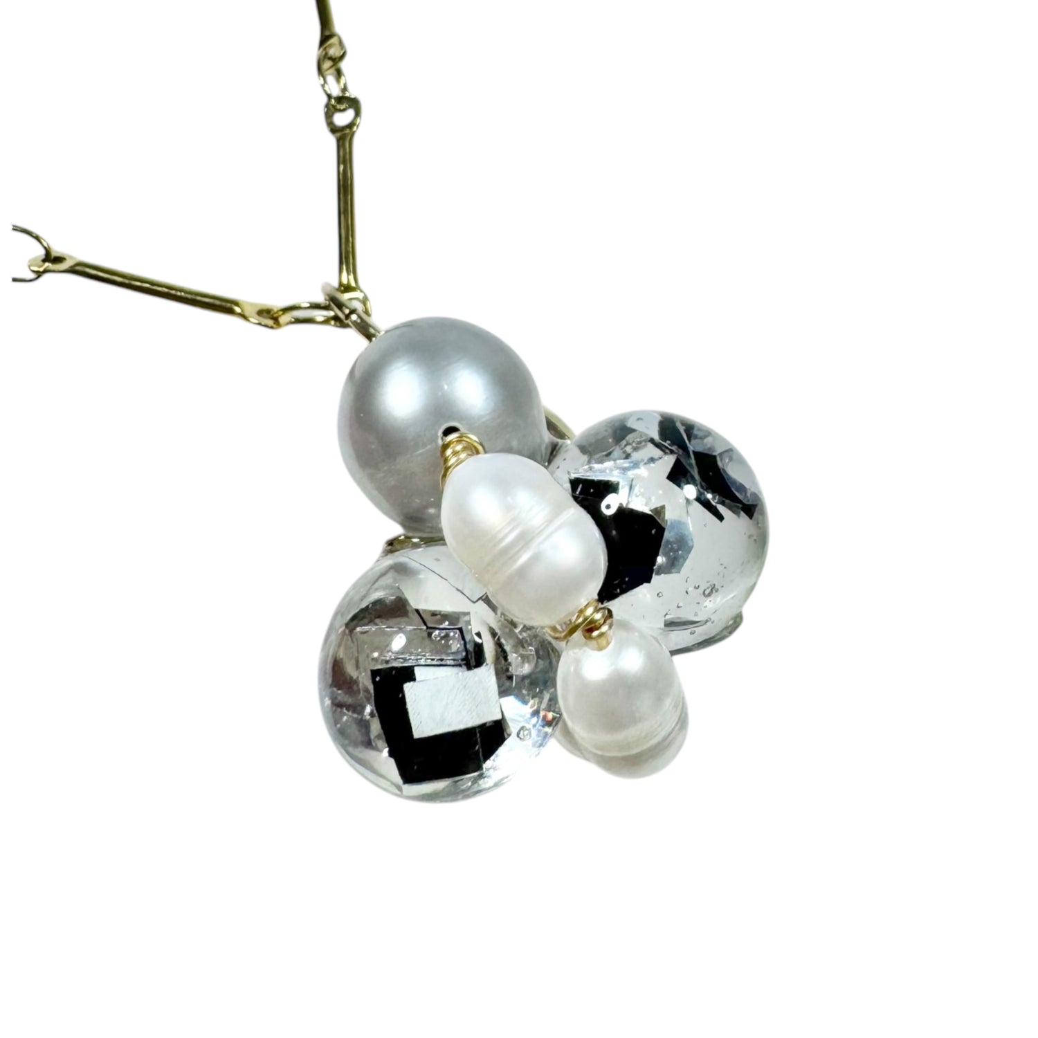Bee Divine midnight black bee necklace with fresh water pearls handcrafted from upcycled plastic, featuring delicate bee-inspired designs with lightweight, eco-friendly materials. A sustainable statement piece for nature lovers.