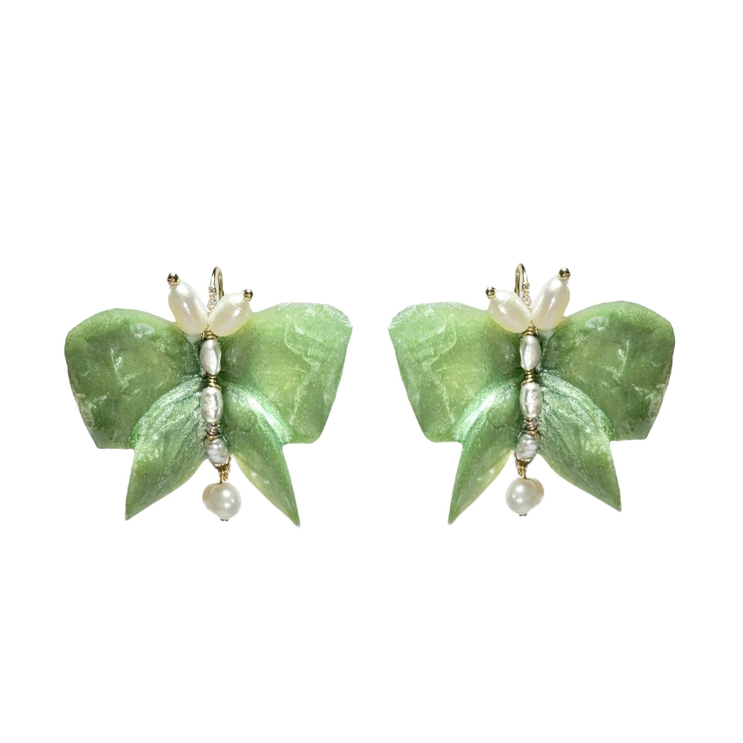 Upcycled butterfly earrings in soft mint green, handcrafted with a nature-inspired design and finished in a fresh Mint Breeze tone.