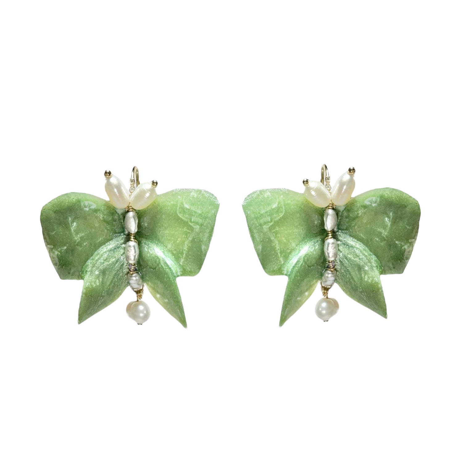 Upcycled butterfly earrings in soft mint green, handcrafted with a nature-inspired design and finished in a fresh Mint Breeze tone.