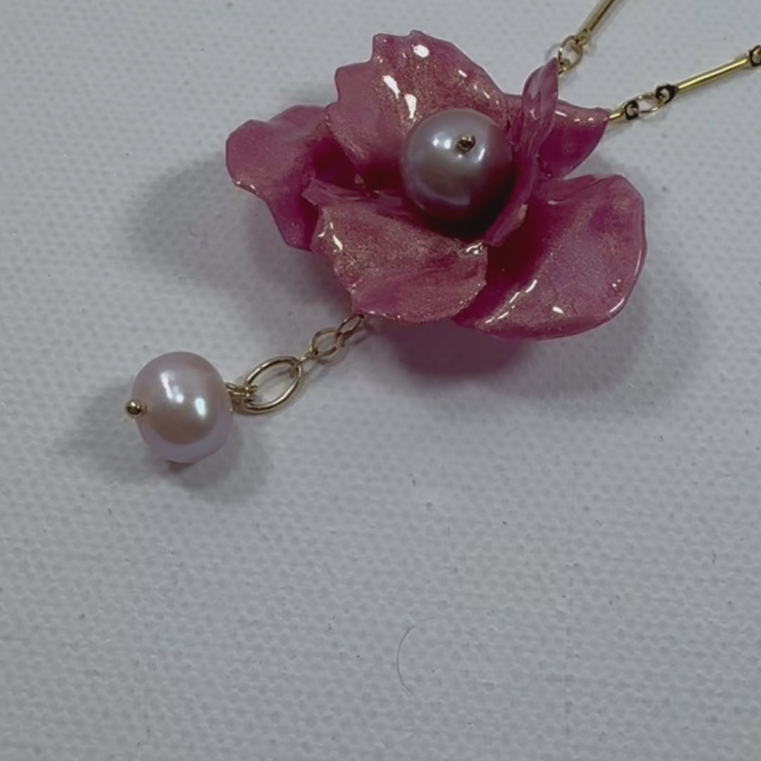 Handcrafted Anemone necklace made from upcycled plastic, inspired by Japanese anemones in Antique petal pink rose. Lightweight, eco-friendly statement jewelry for sustainable fashion lovers.