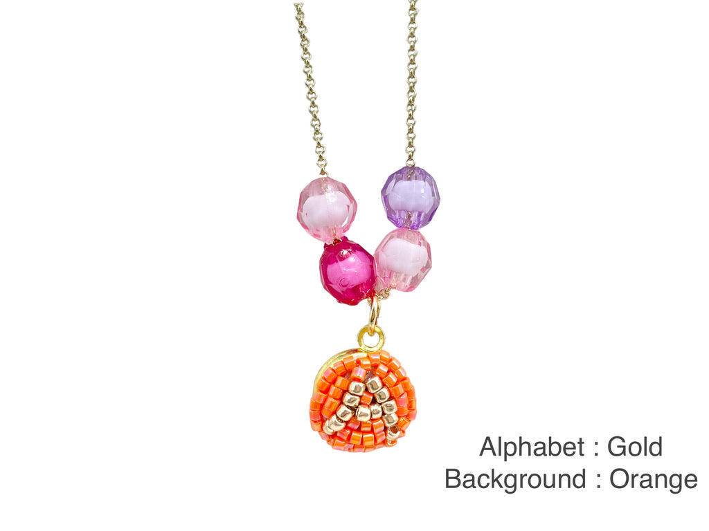 Hand-beaded kids alphabet necklace - personalised letter necklace gift by Melmomilk Design Singapore