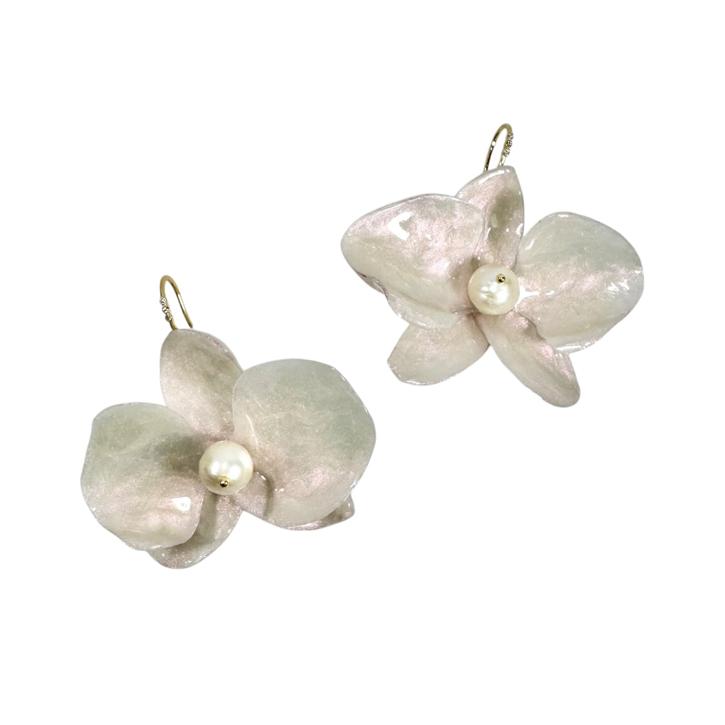 Handmade upcycled orchid earrings crafted from recycled PET bottles, eco-friendly floral jewelry by a Singapore artisan, lightweight and elegant design.