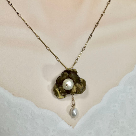Handcrafted Anemone necklace made from upcycled plastic, inspired by Japanese anemones in vintage gold. Lightweight, eco-friendly statement jewelry for sustainable fashion lovers.