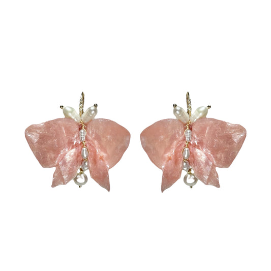 Soft pink butterfly earrings made from upcycled materials, featuring a romantic Pink Chiffon finish and delicate handmade detailing.