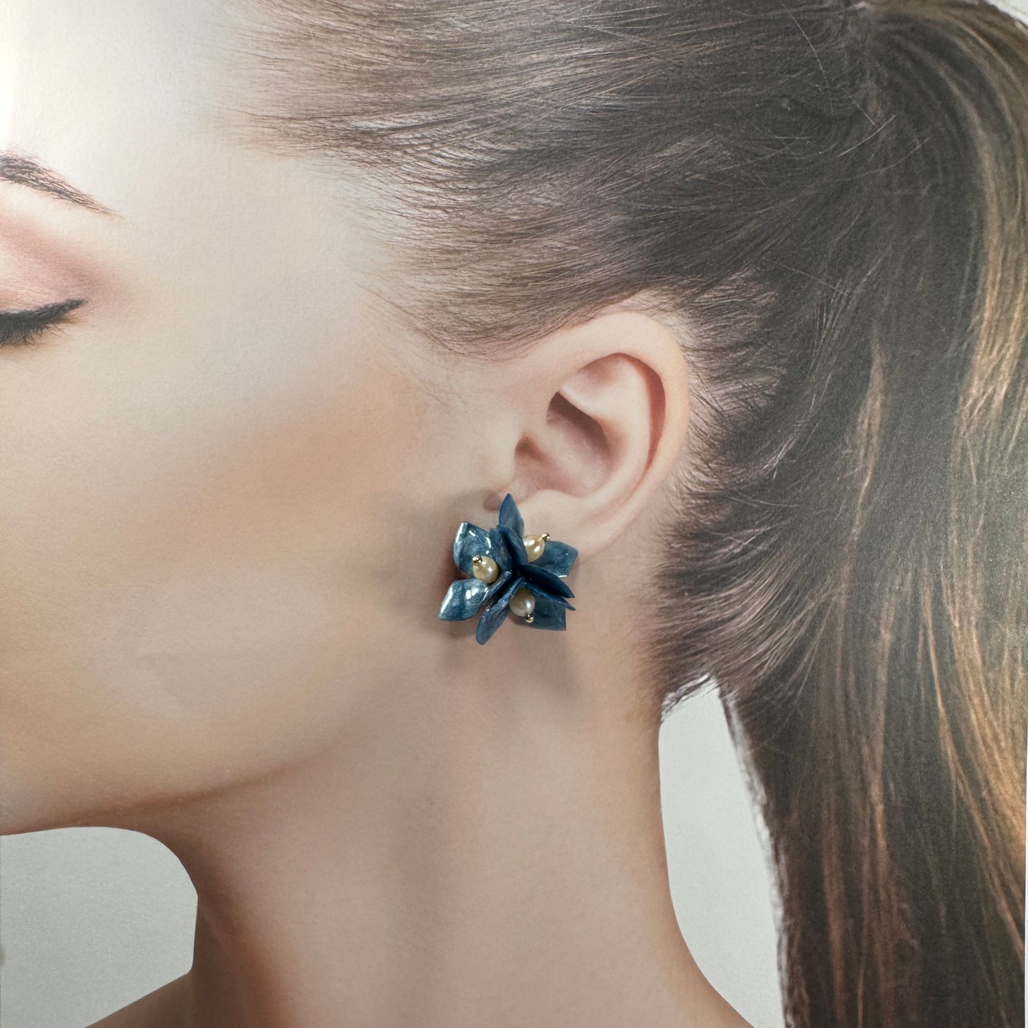 Lilac Fantasy earrings handcrafted from upcycled plastic, featuring deep indigo blue accents. Lightweight, eco-friendly statement jewelry for sustainable fashion lovers.