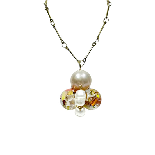 Bee Divine honey bee necklace with fresh water pearls handcrafted from upcycled plastic, featuring delicate bee-inspired designs with lightweight, eco-friendly materials. A sustainable statement piece for nature lovers.