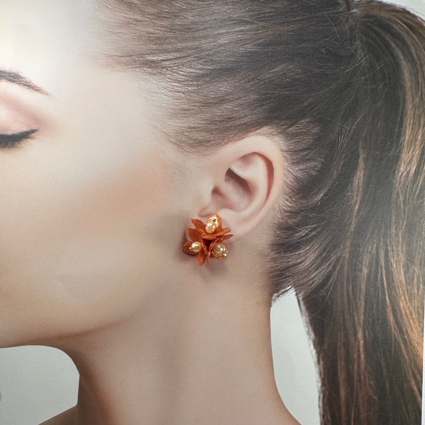 Lilac Fantasy earrings handcrafted from upcycled plastic, featuring amber orange accents. Lightweight, eco-friendly statement jewelry for sustainable fashion lovers.