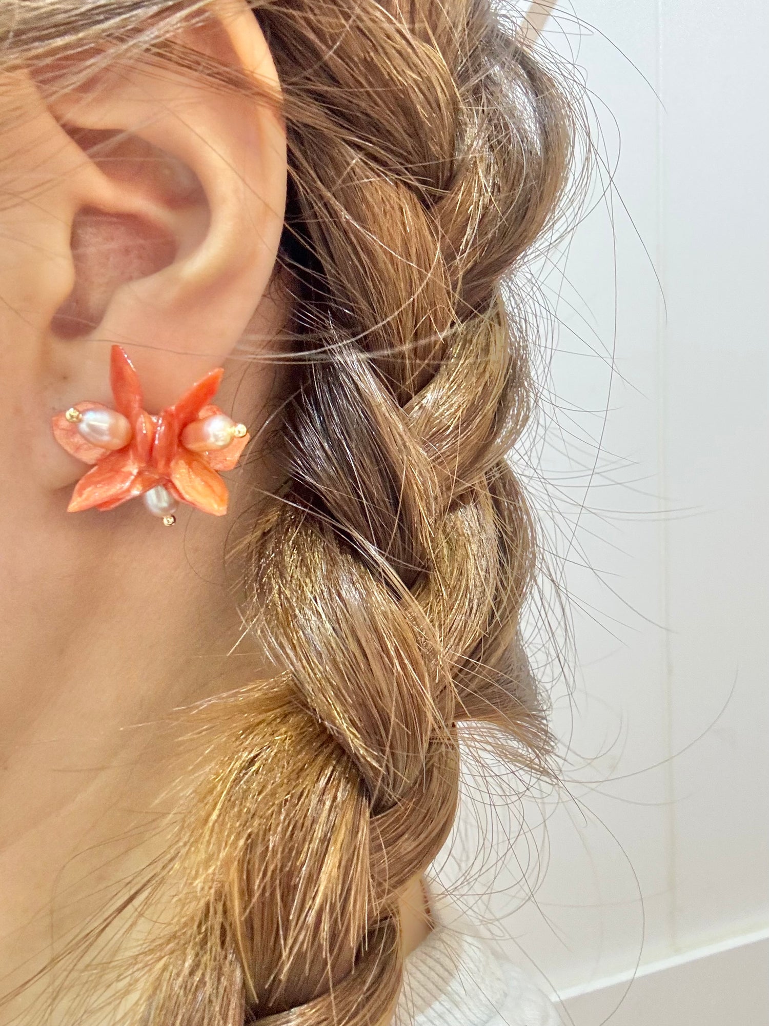 Lilac Fantasy earrings handcrafted from upcycled plastic, featuring amber orange accents. Lightweight, eco-friendly statement jewelry for sustainable fashion lovers.