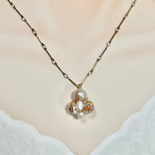 Bee Divine honey bee necklace with fresh water pearls handcrafted from upcycled plastic, featuring delicate bee-inspired designs with lightweight, eco-friendly materials. A sustainable statement piece for nature lovers.