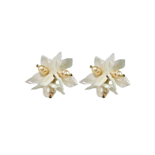 Lilac Fantasy earrings handcrafted from upcycled plastic, featuring pearl ivory white accents. Lightweight, eco-friendly statement jewelry for sustainable fashion lovers.