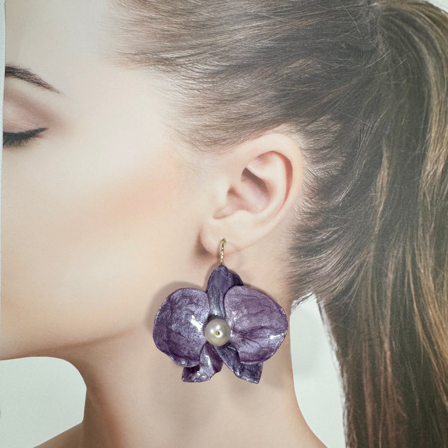 Handmade upcycled orchid earrings crafted from recycled PET bottles, eco-friendly floral jewelry by a Singapore artisan, lightweight and elegant design.