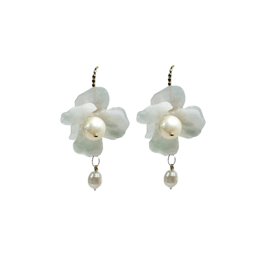 Anemone Collection earrings handcrafted from upcycled plastic, inspired by Japanese white pearl anemones. Lightweight, nature-inspired statement jewelry for eco-conscious fashion lovers.