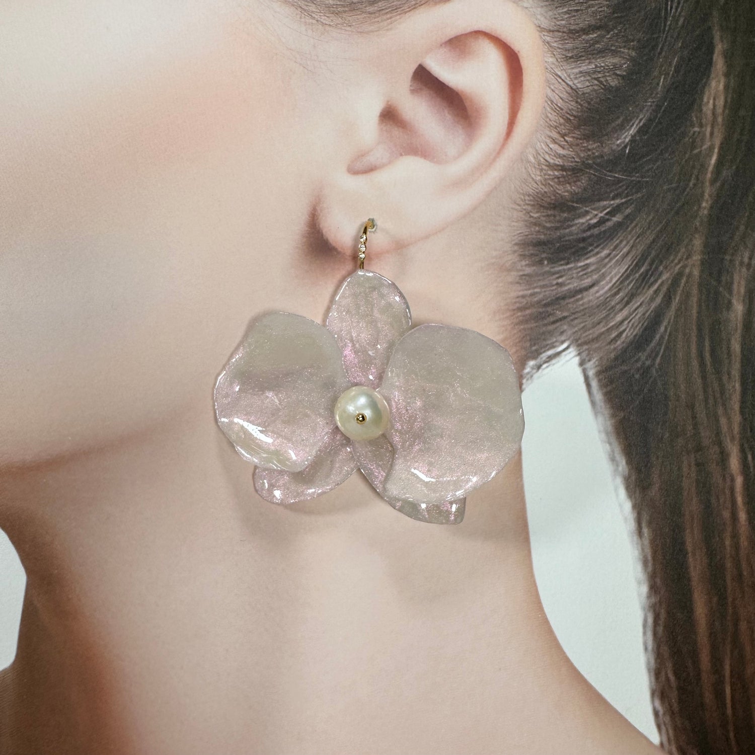 Handmade upcycled orchid earrings crafted from recycled PET bottles, eco-friendly floral jewelry by a Singapore artisan, lightweight and elegant design.