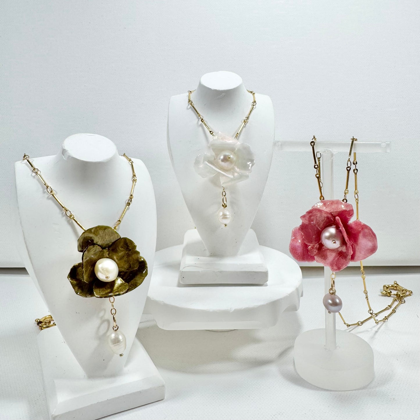 Handcrafted Anemone necklace made from upcycled plastic, inspired by Japanese anemones in vintage gold. Lightweight, eco-friendly statement jewelry for sustainable fashion lovers.