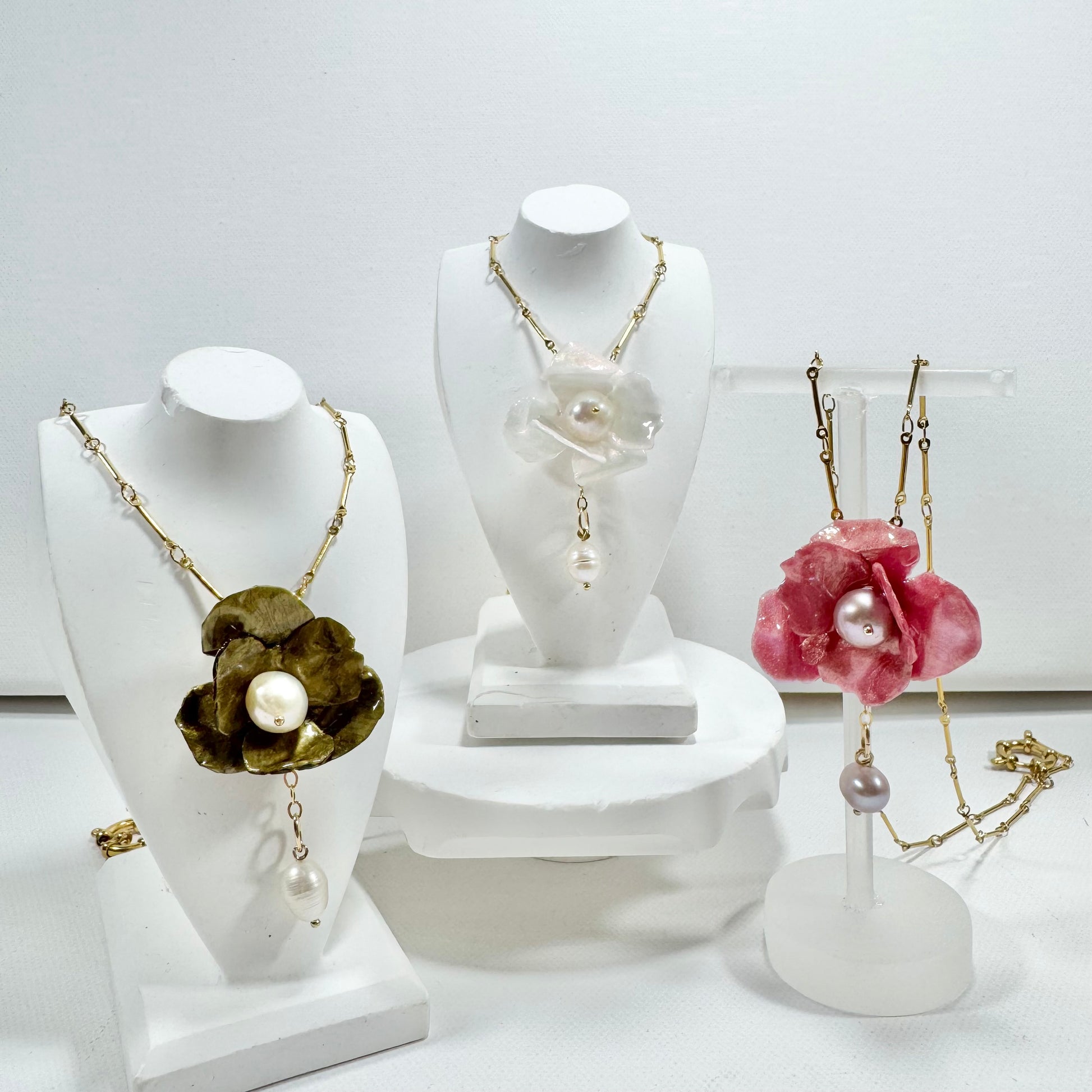 Handcrafted Anemone necklace made from upcycled plastic, inspired by Japanese anemones in vintage gold. Lightweight, eco-friendly statement jewelry for sustainable fashion lovers.