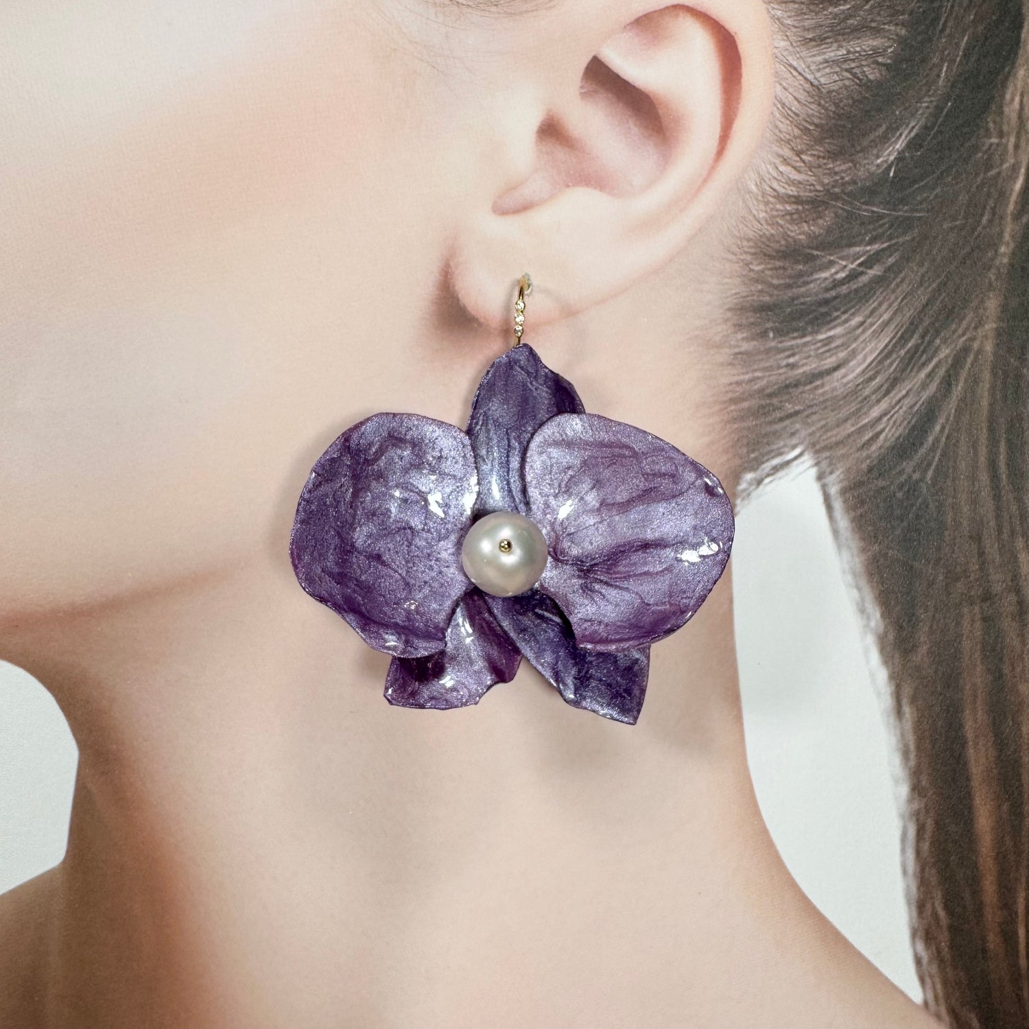 Handmade upcycled orchid earrings crafted from recycled PET bottles, eco-friendly floral jewelry by a Singapore artisan, lightweight and elegant design.