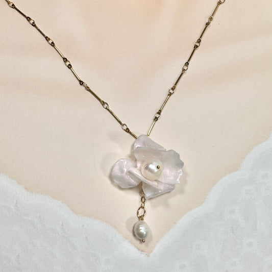 Handcrafted Anemone necklace made from upcycled plastic, inspired by Japanese anemones in white ivory pearl. Lightweight, eco-friendly statement jewelry for sustainable fashion lovers.