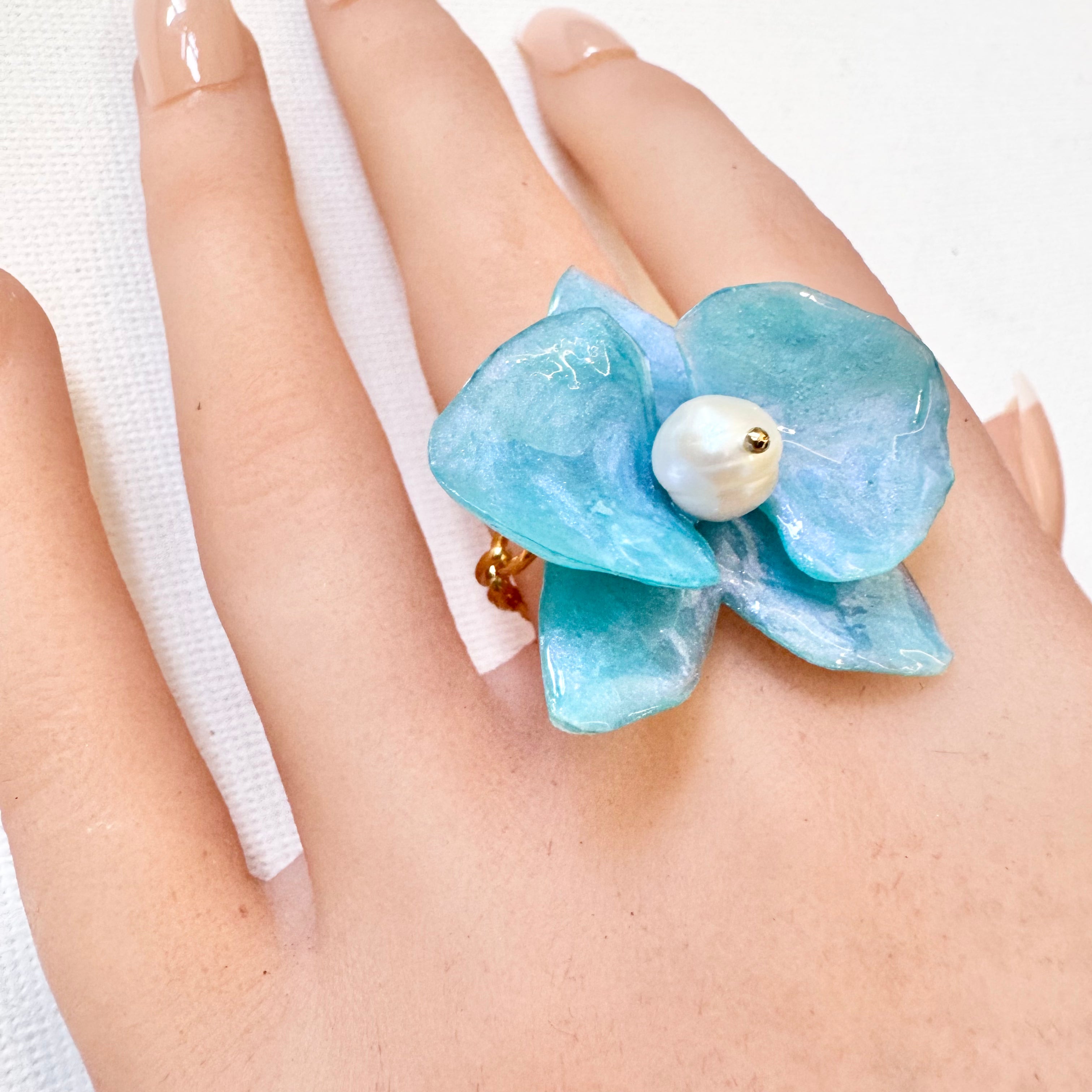 Eternal Orchid ring close-up - handmade flower jewelry from upcycled materials