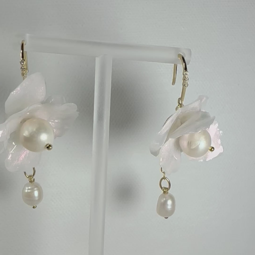 Anemone Collection earrings handcrafted from upcycled plastic, inspired by Japanese white pearl anemones. Lightweight, nature-inspired statement jewelry for eco-conscious fashion lovers.