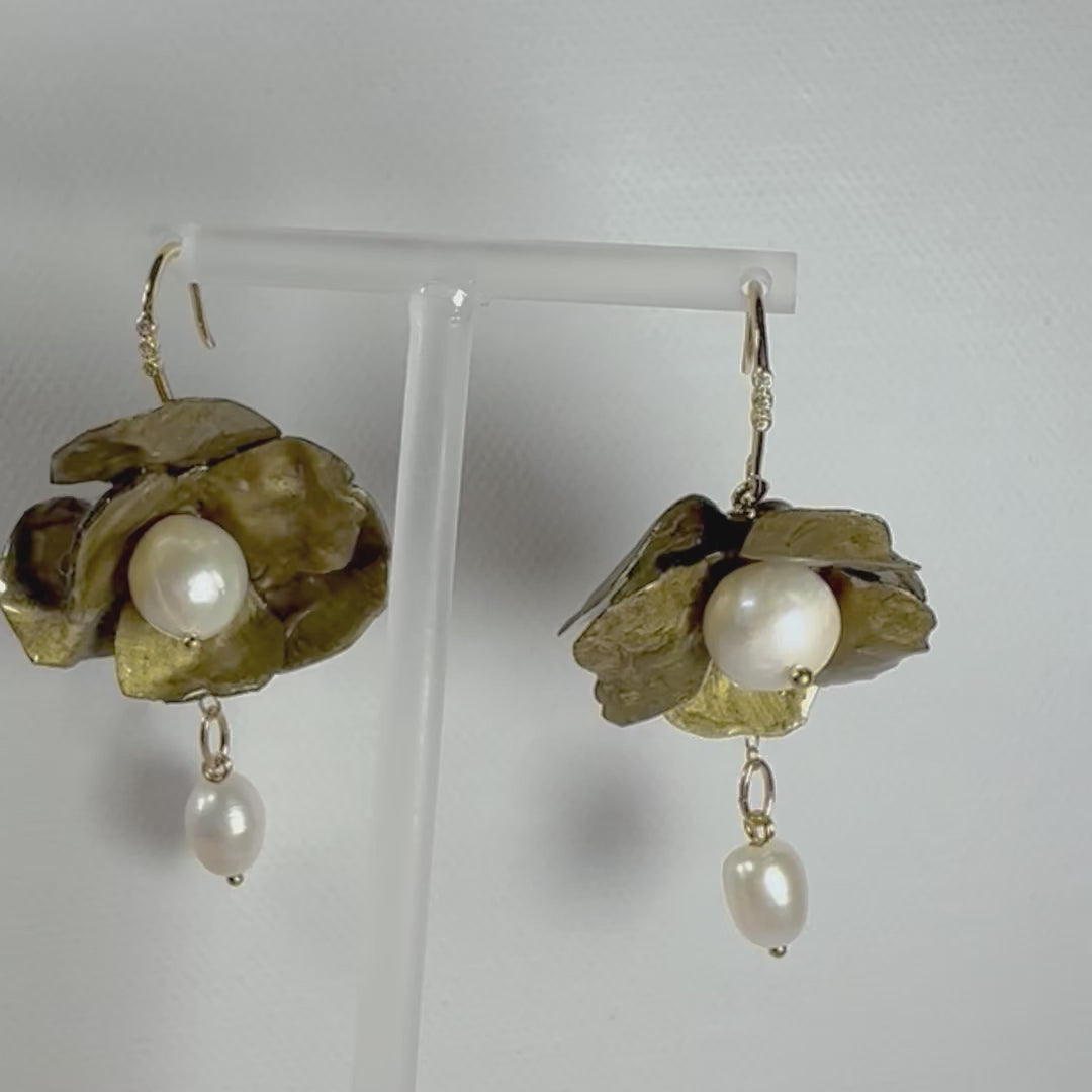 Anemone Collection earrings handcrafted from upcycled plastic, inspired by Japanese vintage gold anemones. Lightweight, nature-inspired statement jewelry for eco-conscious fashion lovers.