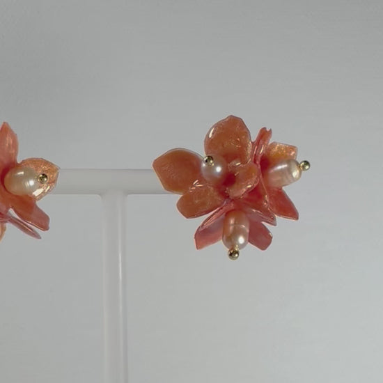 Lilac Fantasy earrings handcrafted from upcycled plastic, featuring amber orange accents. Lightweight, eco-friendly statement jewelry for sustainable fashion lovers.